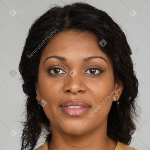 Joyful black young-adult female with medium  brown hair and brown eyes