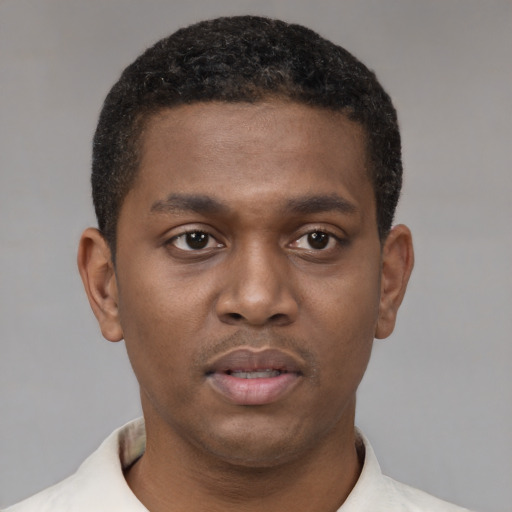 Neutral latino young-adult male with short  brown hair and brown eyes