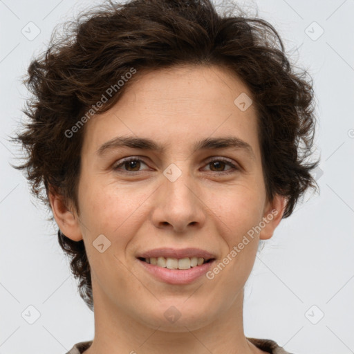 Joyful white adult female with short  brown hair and brown eyes