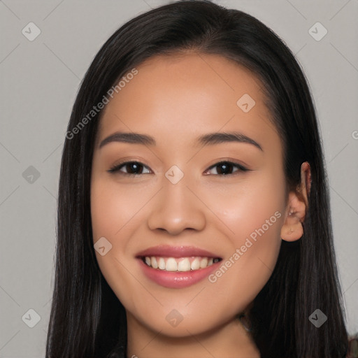 Joyful white young-adult female with long  black hair and brown eyes