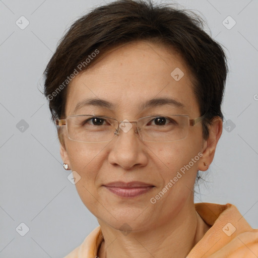 Joyful white adult female with short  brown hair and brown eyes