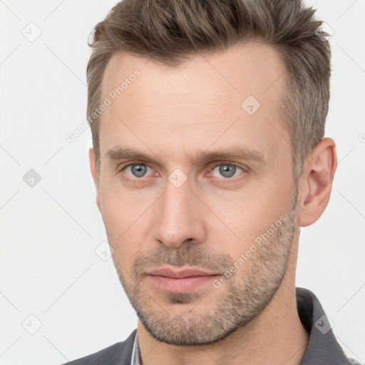 Neutral white adult male with short  brown hair and brown eyes