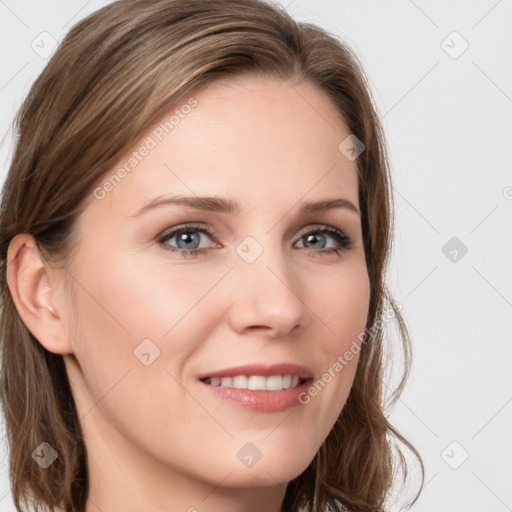 Joyful white young-adult female with long  brown hair and blue eyes