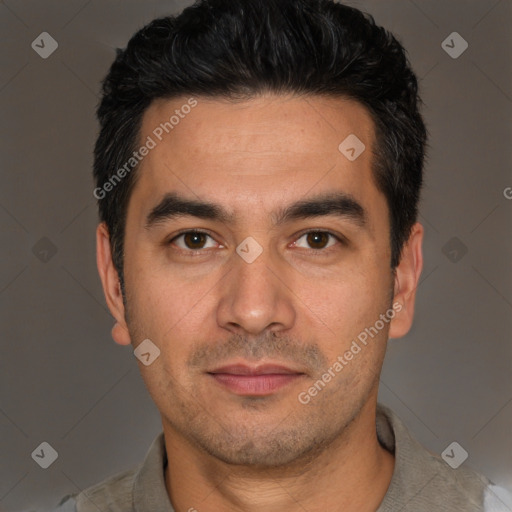 Joyful white young-adult male with short  black hair and brown eyes