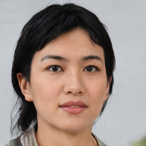 Neutral asian young-adult female with medium  black hair and brown eyes