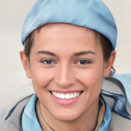 Joyful white young-adult female with short  brown hair and blue eyes