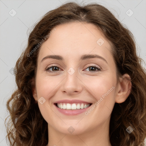 Joyful white young-adult female with long  brown hair and green eyes