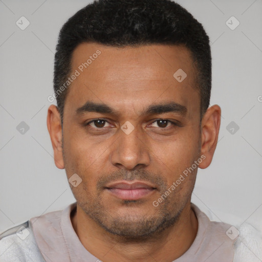 Neutral latino young-adult male with short  black hair and brown eyes