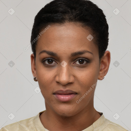 Joyful black young-adult female with short  black hair and brown eyes