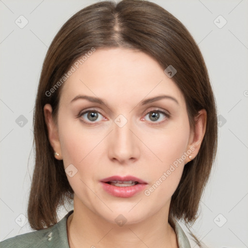 Neutral white young-adult female with medium  brown hair and grey eyes