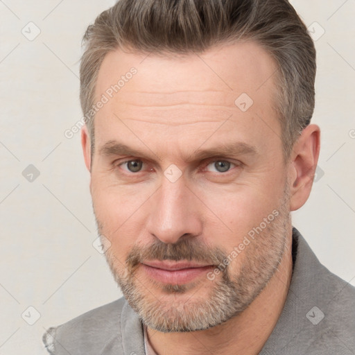 Neutral white adult male with short  brown hair and brown eyes