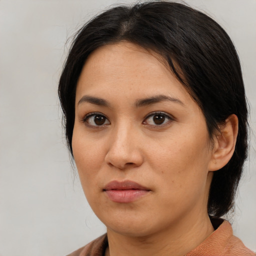 Neutral asian young-adult female with medium  brown hair and brown eyes