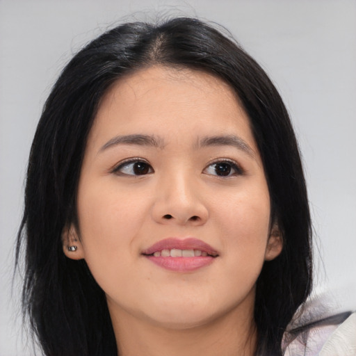 Joyful asian young-adult female with medium  black hair and brown eyes