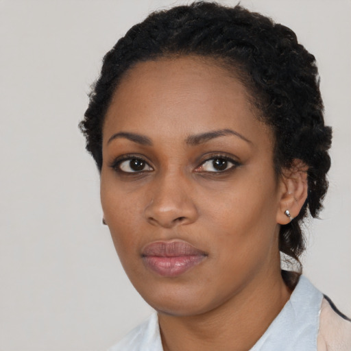 Neutral black young-adult female with short  black hair and brown eyes