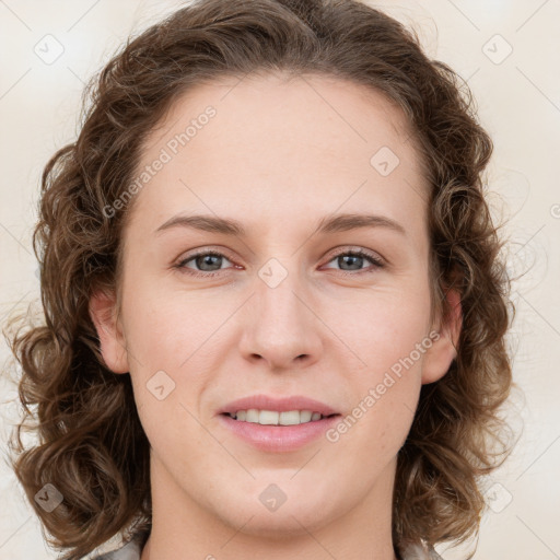 Joyful white young-adult female with medium  brown hair and green eyes