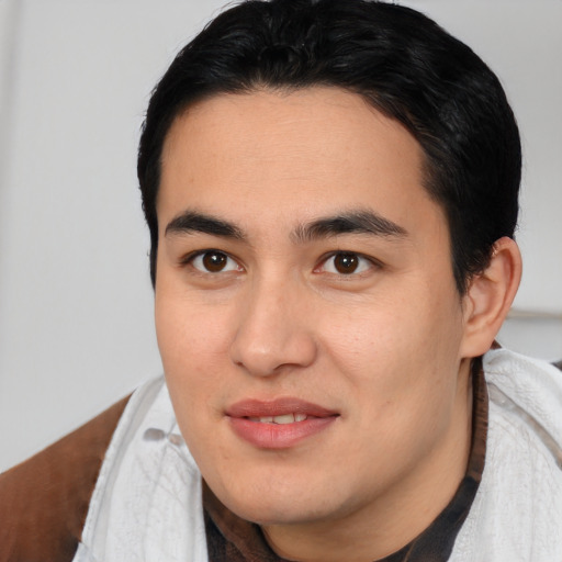 Joyful white young-adult male with medium  brown hair and brown eyes
