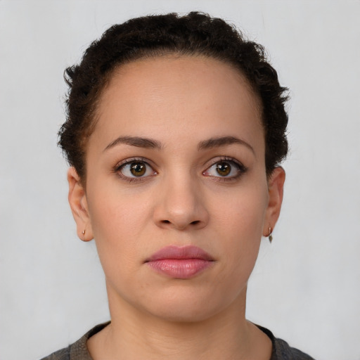 Neutral latino young-adult female with short  brown hair and brown eyes