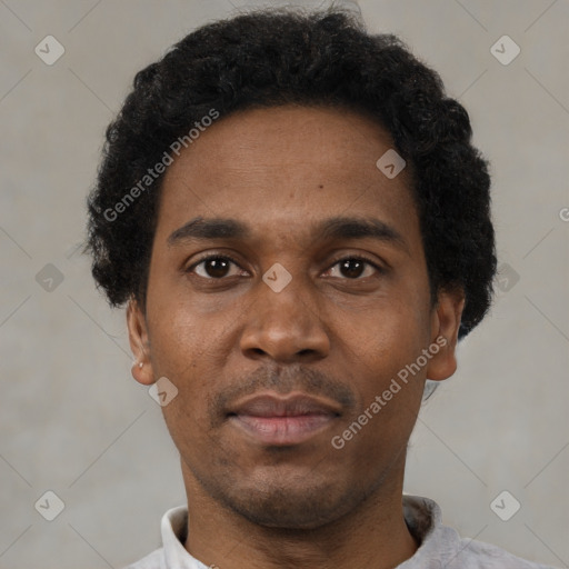 Neutral black adult male with short  black hair and brown eyes
