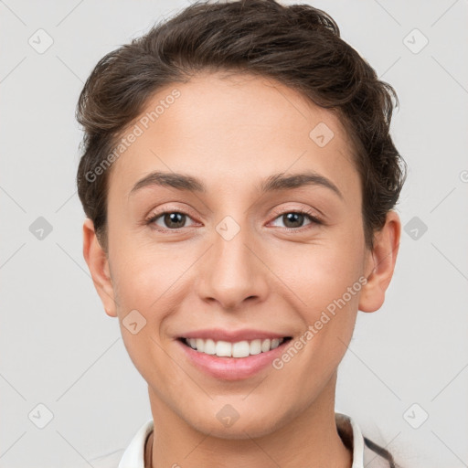 Joyful white young-adult female with short  brown hair and brown eyes