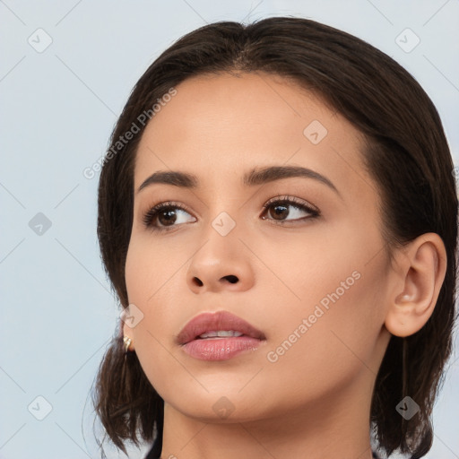 Neutral white young-adult female with medium  brown hair and brown eyes