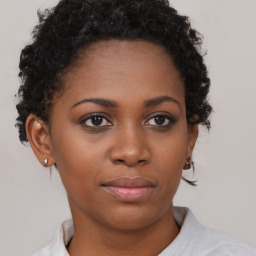 Neutral black young-adult female with short  brown hair and brown eyes