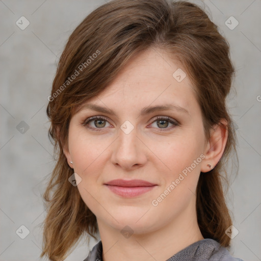 Joyful white young-adult female with medium  brown hair and blue eyes