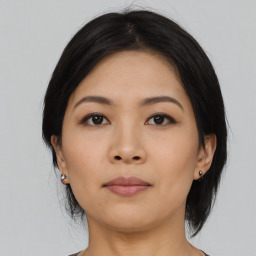 Neutral asian young-adult female with medium  black hair and brown eyes