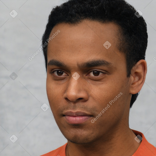 Neutral latino young-adult male with short  black hair and brown eyes