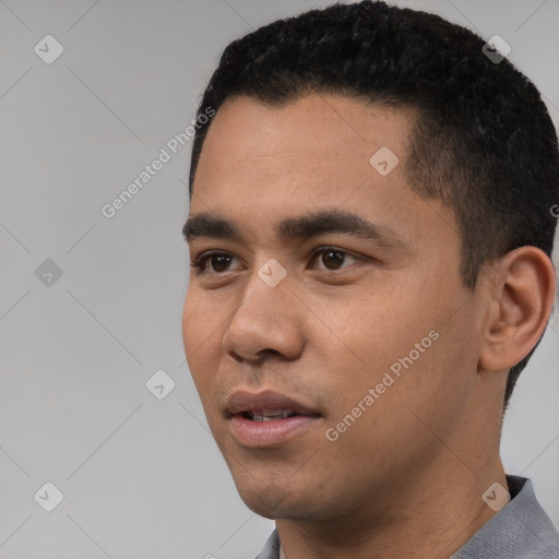 Neutral white young-adult male with short  black hair and brown eyes