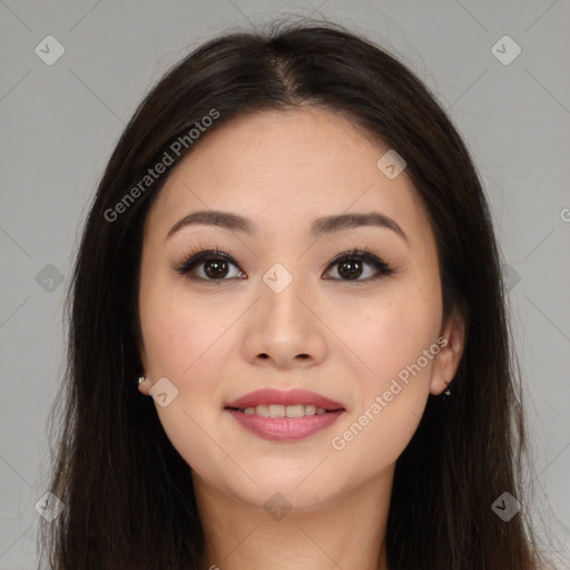 Joyful asian young-adult female with long  brown hair and brown eyes