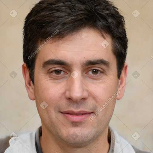 Joyful white young-adult male with short  brown hair and brown eyes