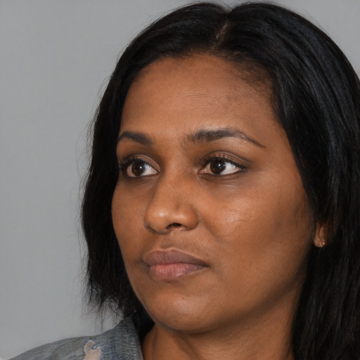 Neutral asian young-adult female with long  black hair and brown eyes