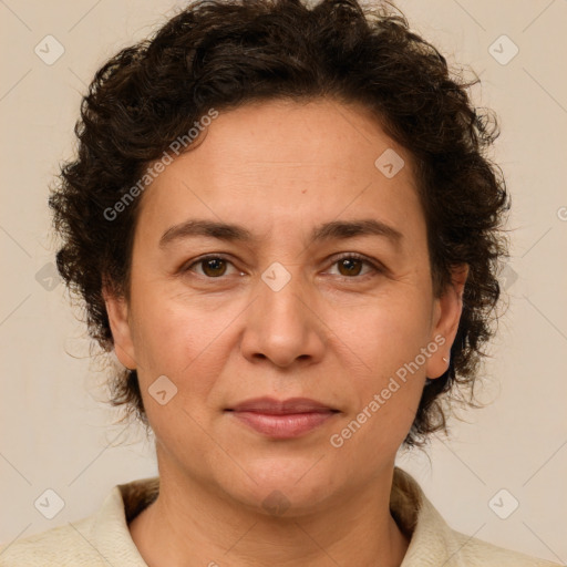 Joyful white adult female with short  brown hair and brown eyes