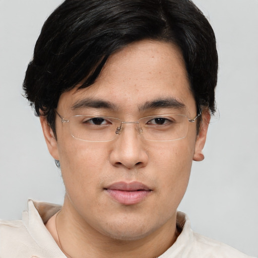 Neutral asian young-adult male with short  brown hair and brown eyes