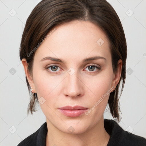 Neutral white young-adult female with medium  brown hair and grey eyes