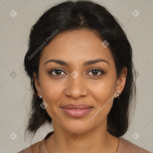 Joyful black young-adult female with medium  brown hair and brown eyes
