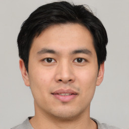 Neutral asian young-adult male with short  black hair and brown eyes