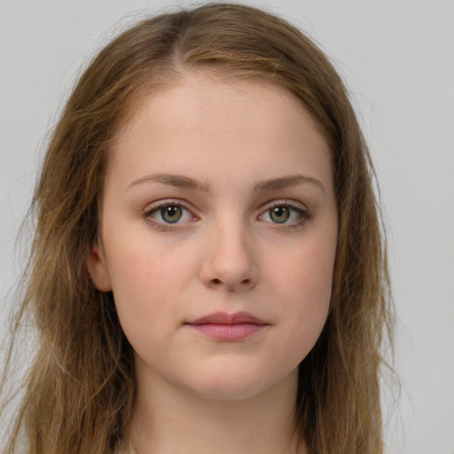 Neutral white young-adult female with long  brown hair and green eyes