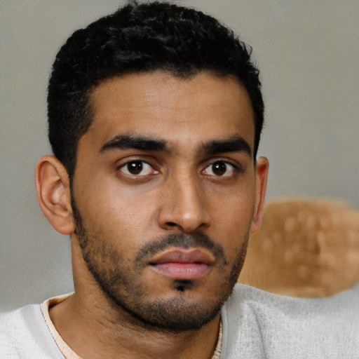 Neutral latino young-adult male with short  black hair and brown eyes