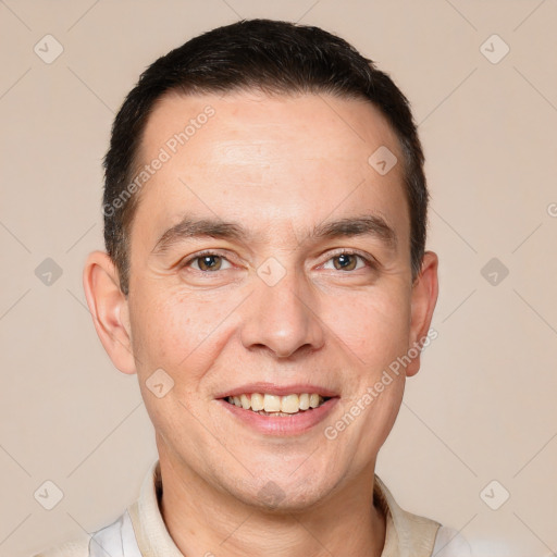 Joyful white adult male with short  brown hair and brown eyes