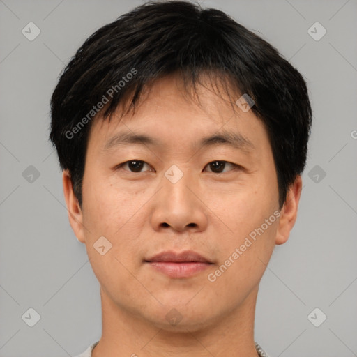 Neutral asian young-adult male with short  brown hair and brown eyes