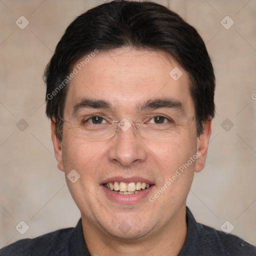 Joyful white adult male with short  black hair and brown eyes