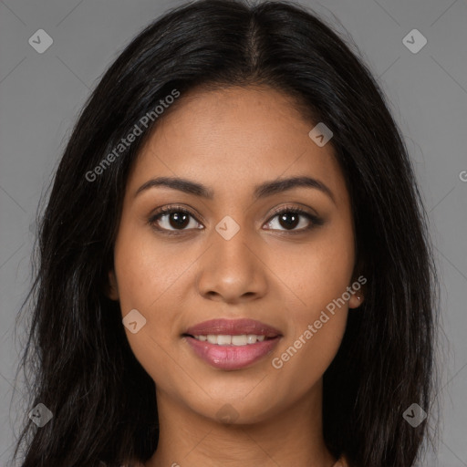 Joyful latino young-adult female with long  brown hair and brown eyes