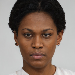 Neutral black young-adult female with short  black hair and brown eyes