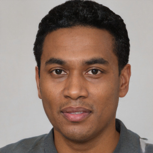 Neutral black young-adult male with short  black hair and brown eyes