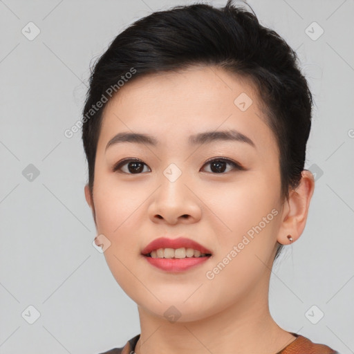 Joyful asian young-adult female with short  black hair and brown eyes