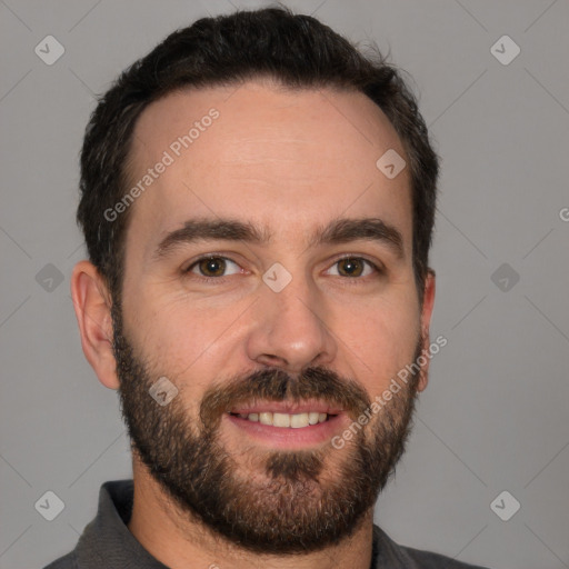 Joyful white young-adult male with short  black hair and brown eyes