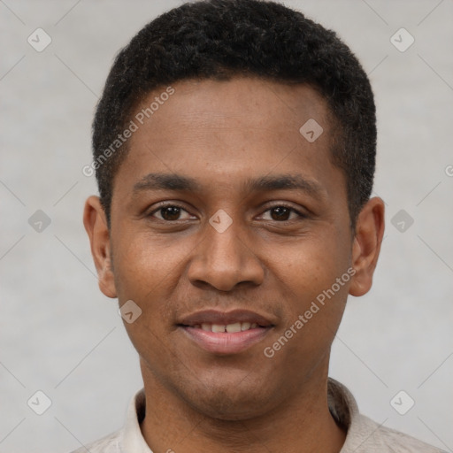 Joyful latino young-adult male with short  brown hair and brown eyes