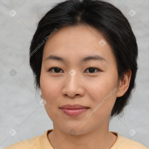 Joyful asian young-adult female with short  brown hair and brown eyes