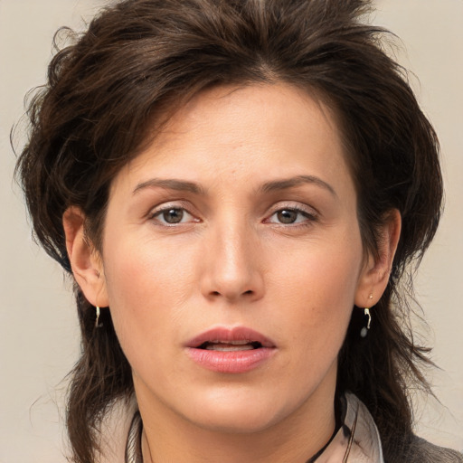 Neutral white young-adult female with medium  brown hair and brown eyes